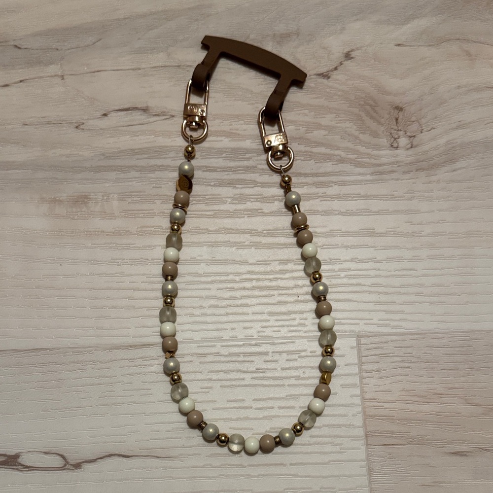 The CAEP beaded phone wristlet